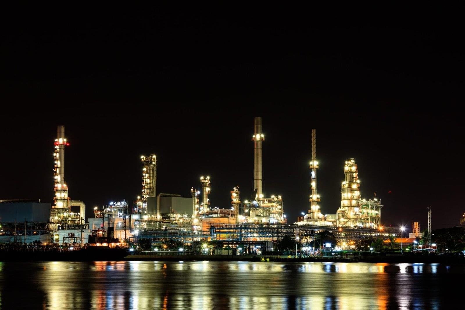 oil refinery night with reflection scaled